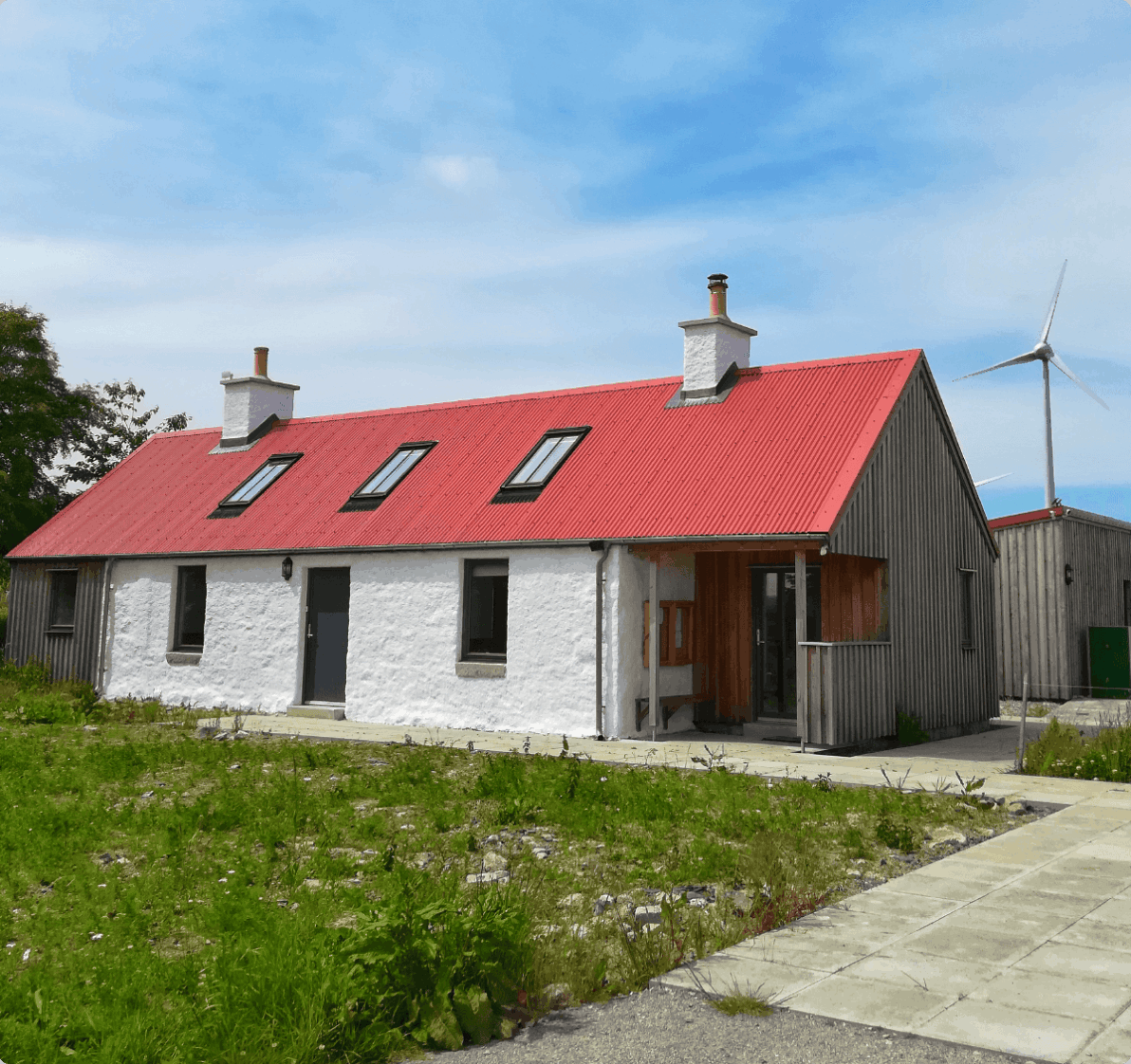 White house with red roof.